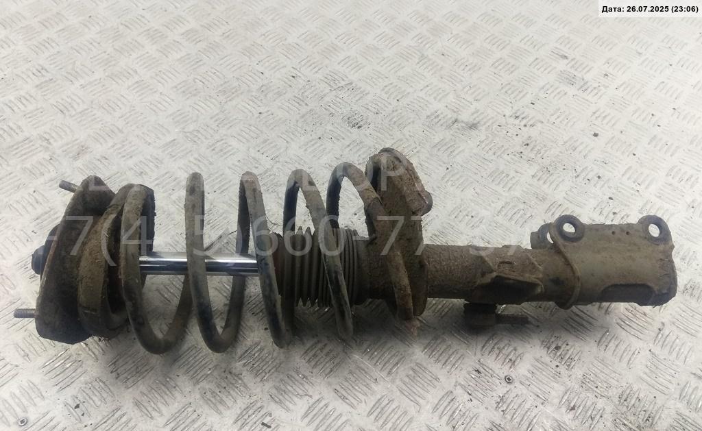 Амортизатор передний левый