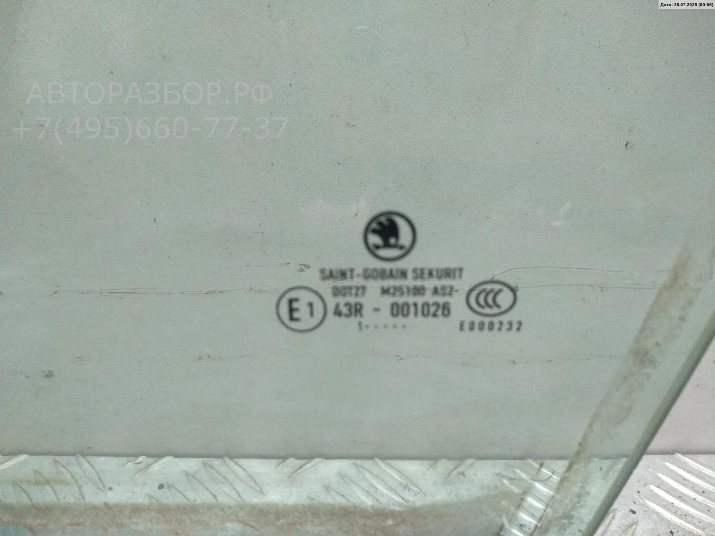 Стекло двери передней левой