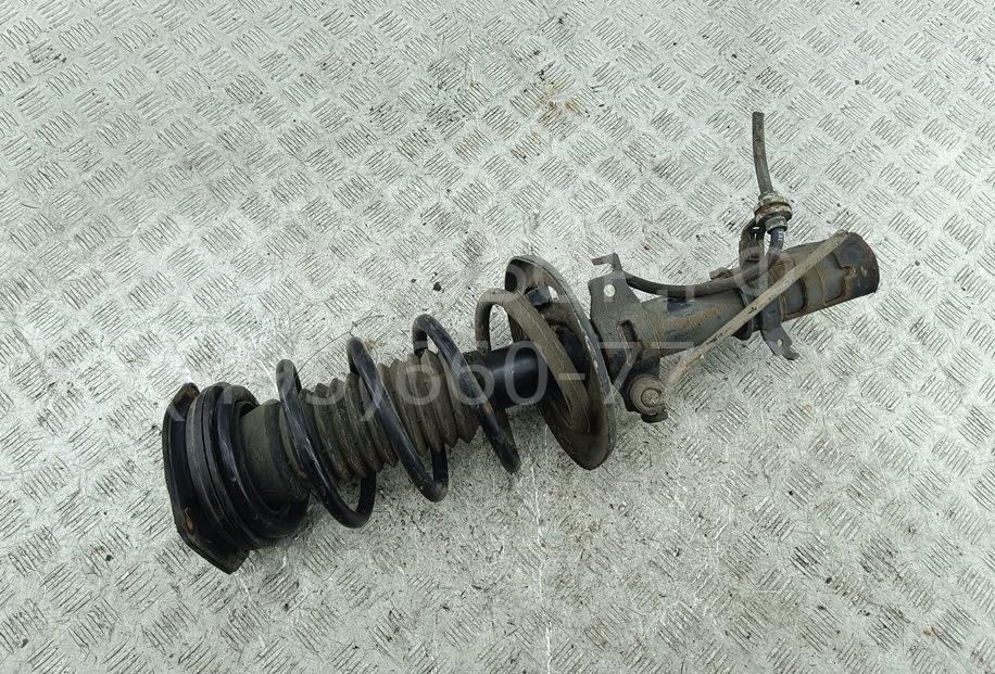 Амортизатор передний левый