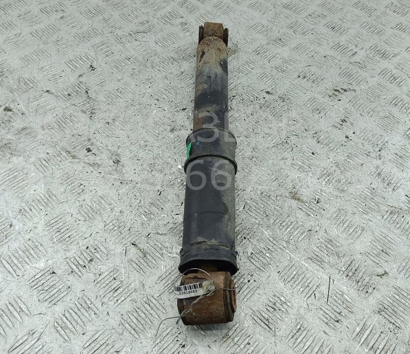 Амортизатор задний левый