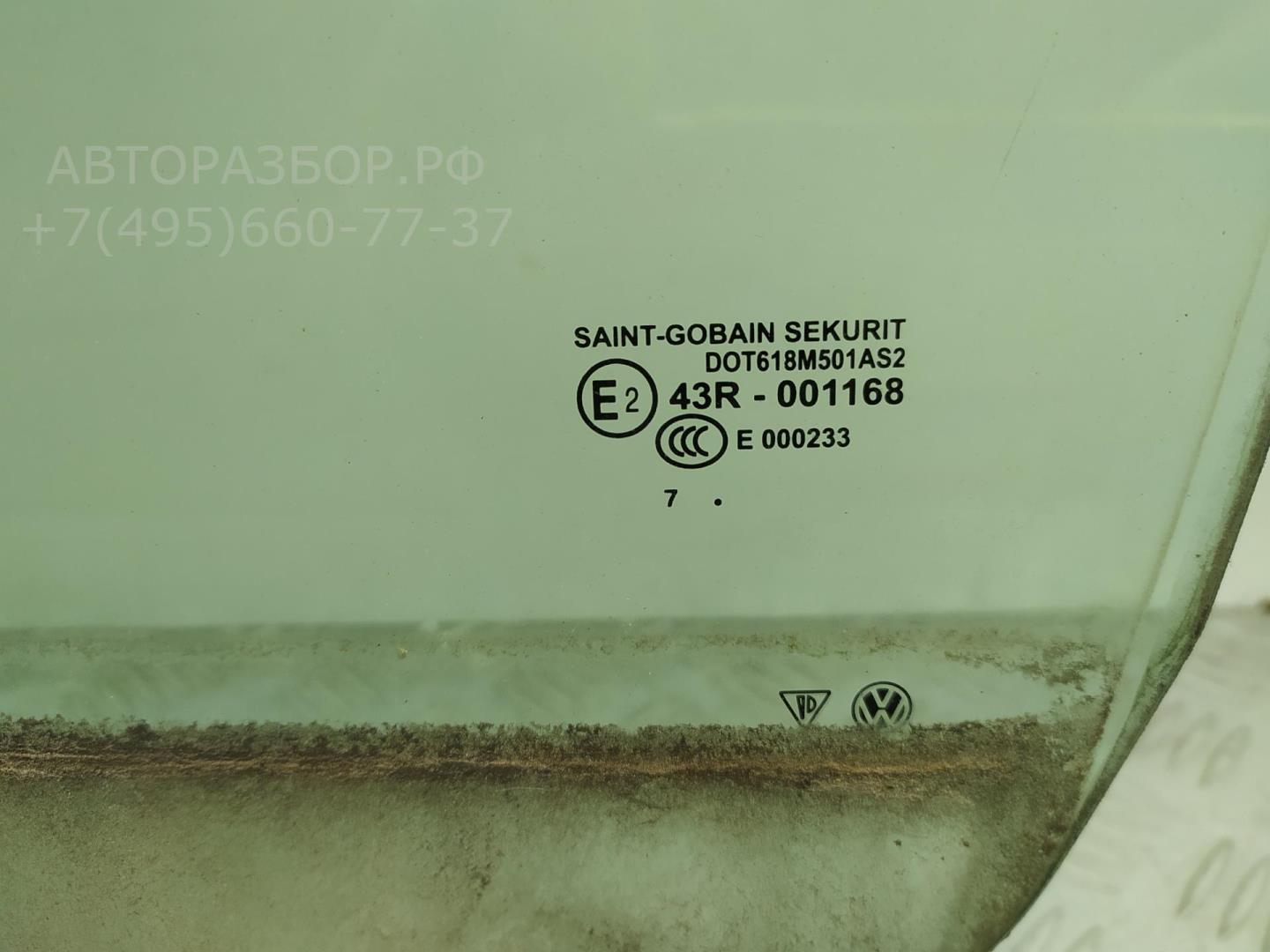Стекло двери передней левой