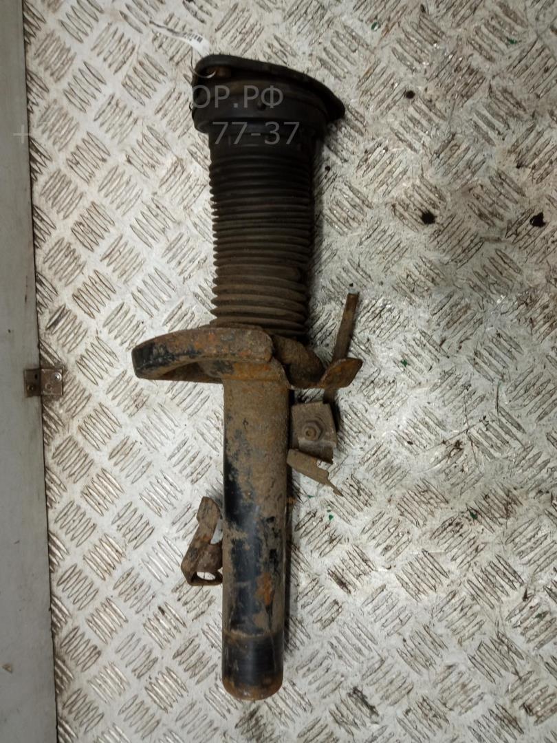 Амортизатор передний левый