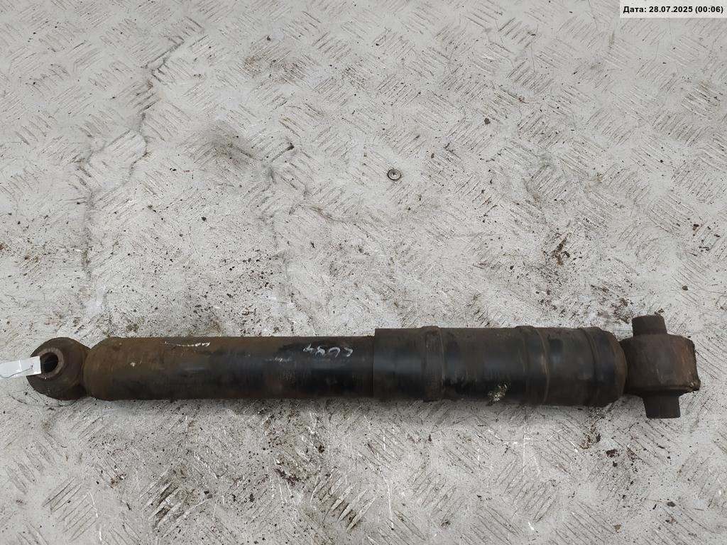 Амортизатор задний левый