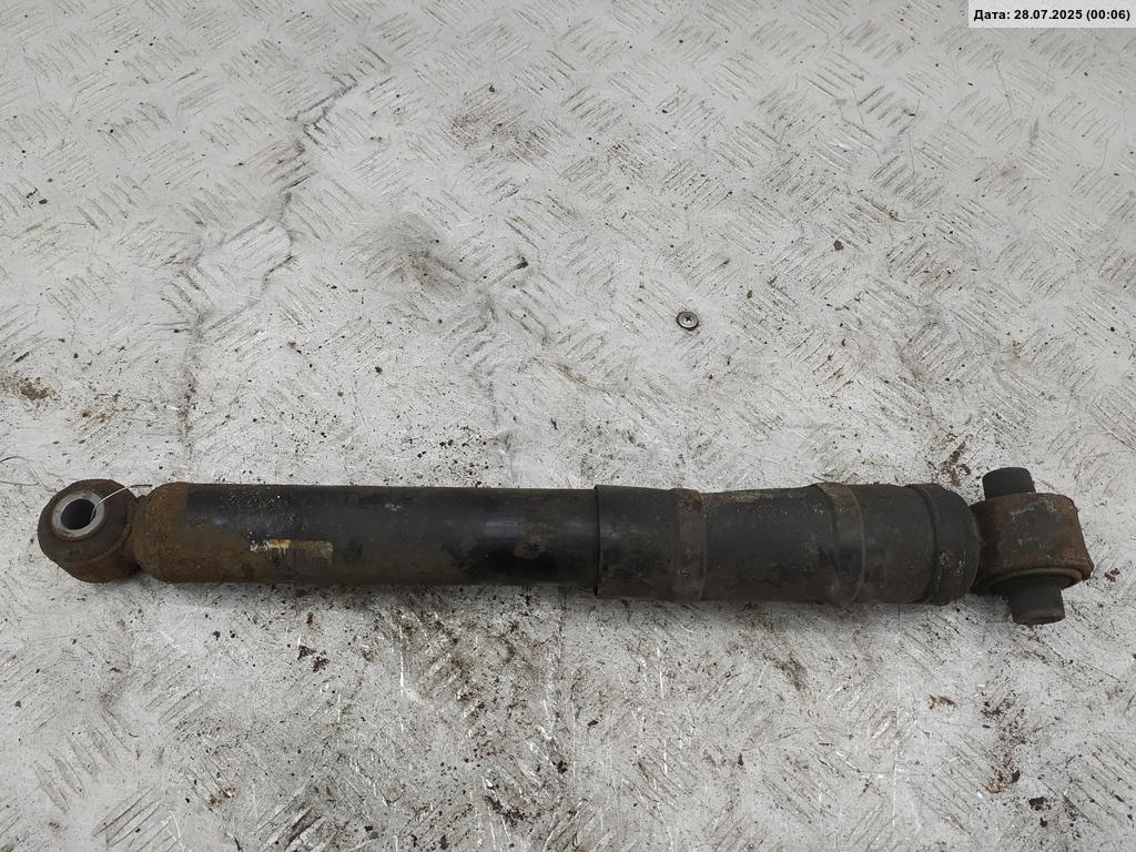 Амортизатор задний левый