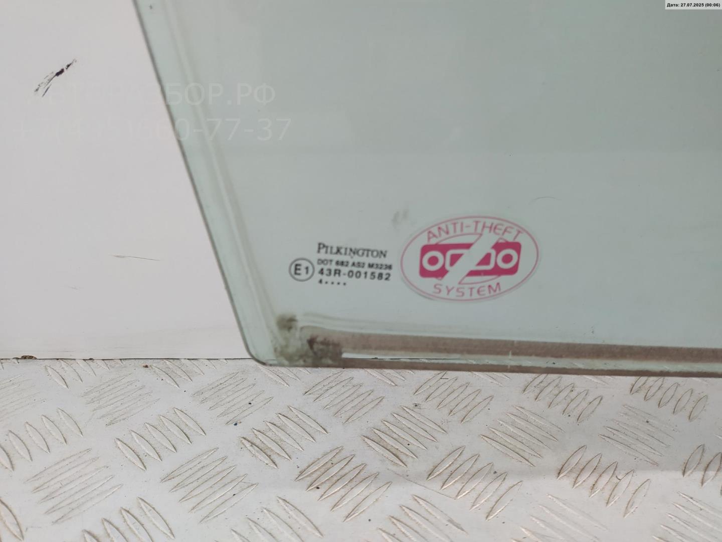 Стекло двери передней правой