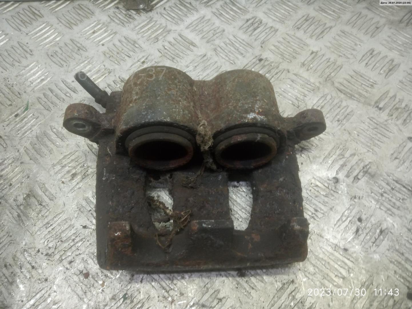 Суппорт передний левый