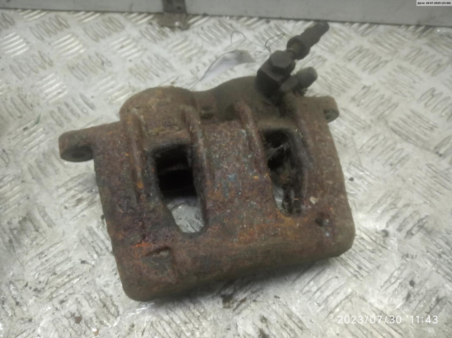 Суппорт передний левый