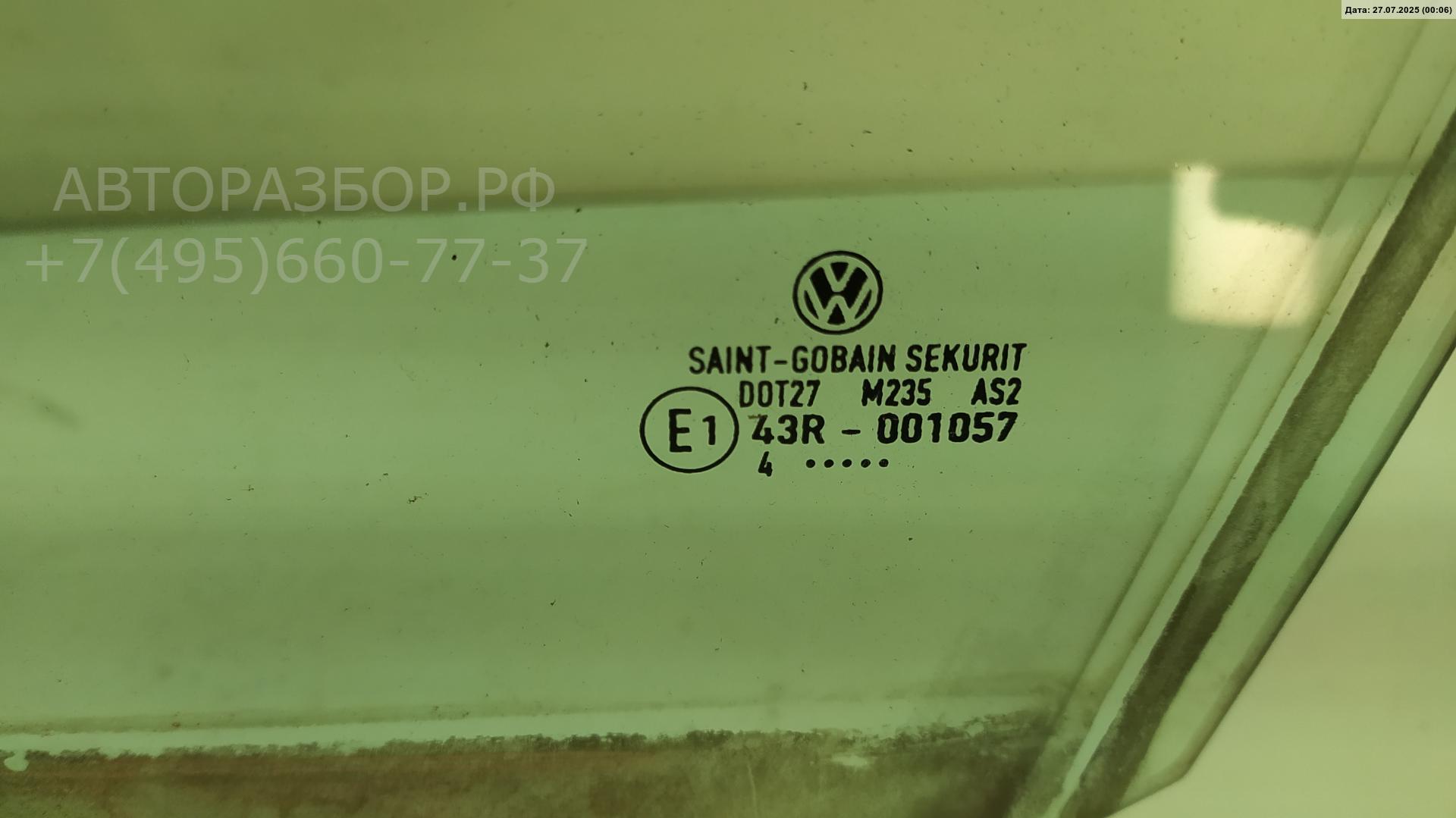 Стекло двери передней левой