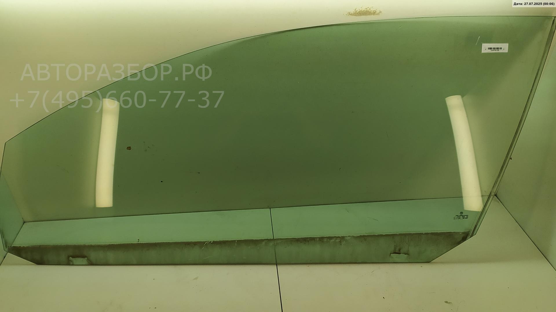 Стекло двери передней левой