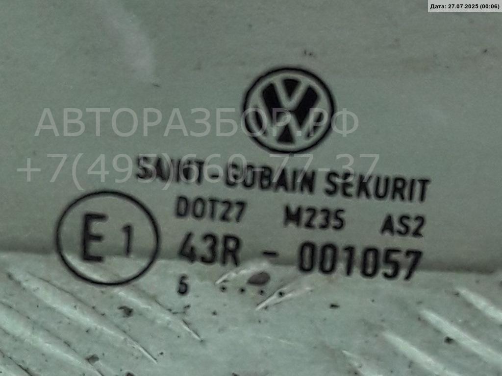 Стекло двери передней левой