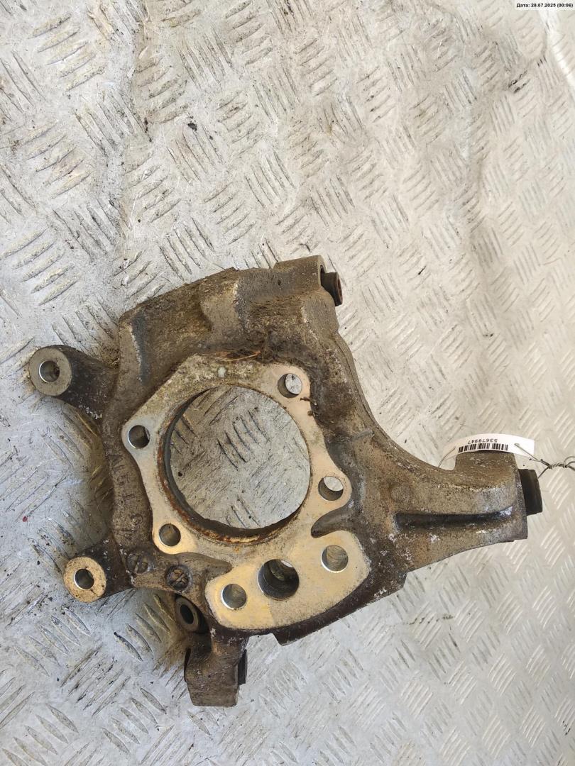 Кулак поворотный задний левый