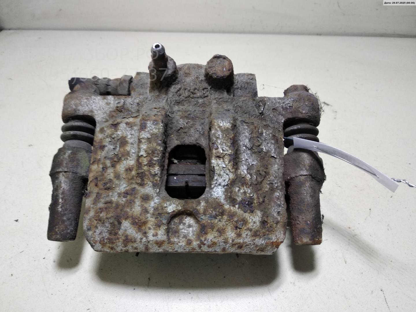 Суппорт задний левый