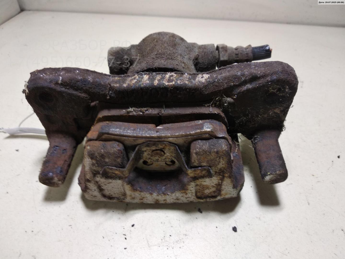 Суппорт задний левый