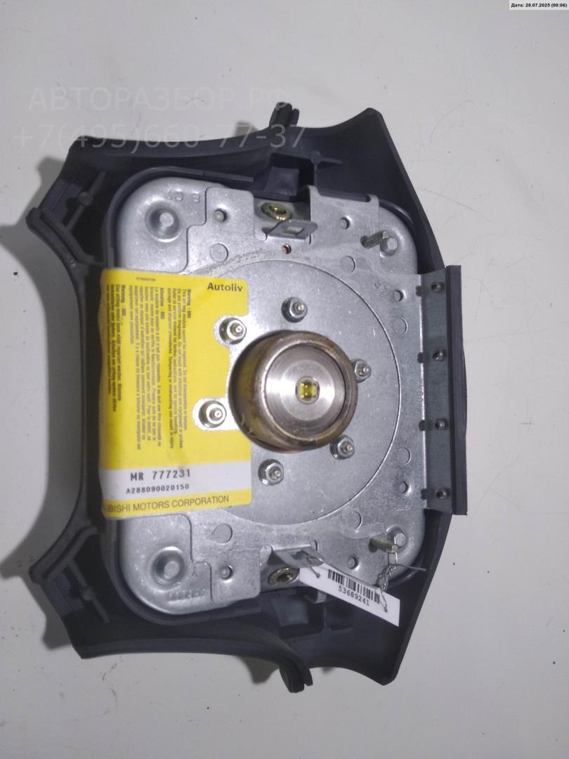 Подушка безопасности в рулевое колесо