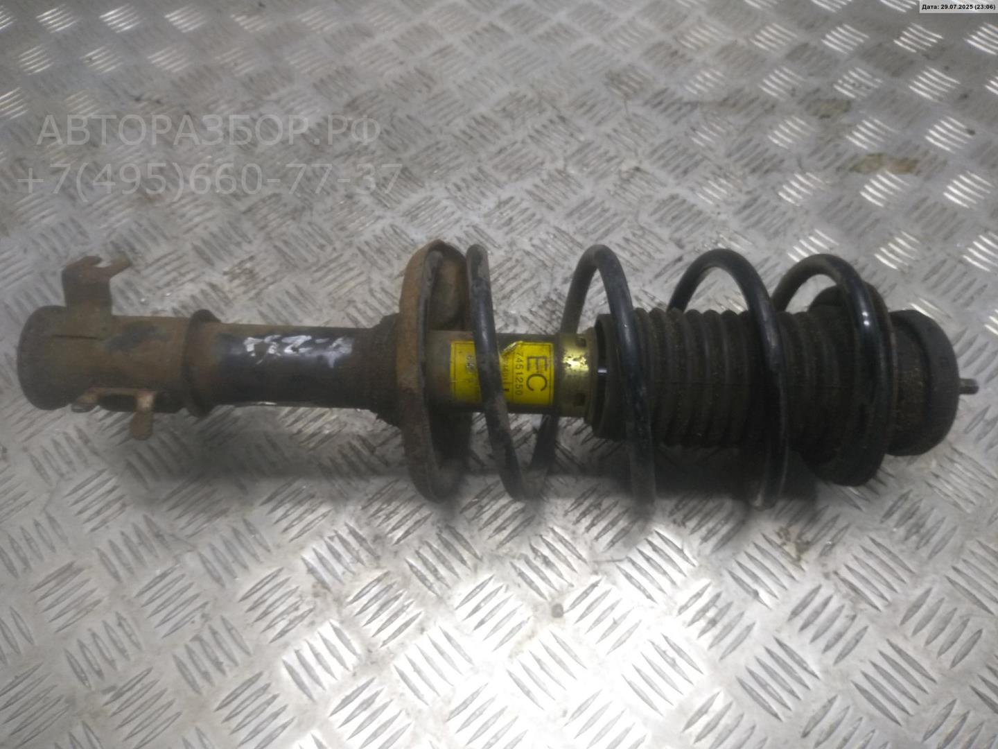 Амортизатор передний левый