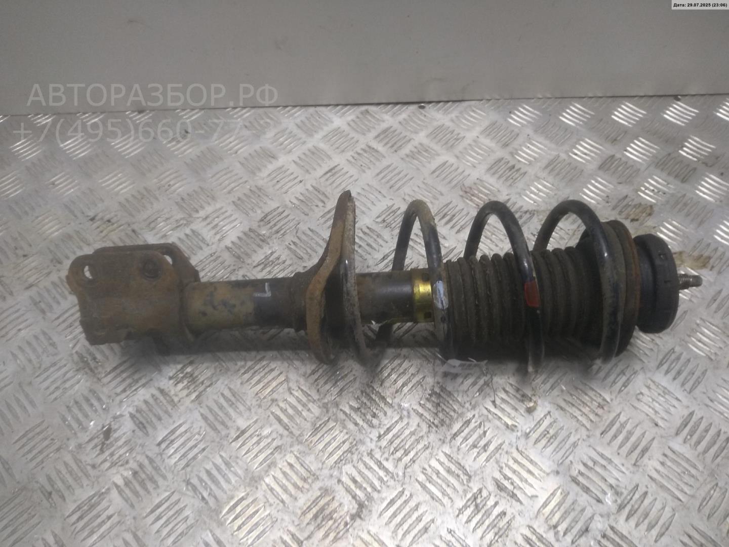 Амортизатор передний левый