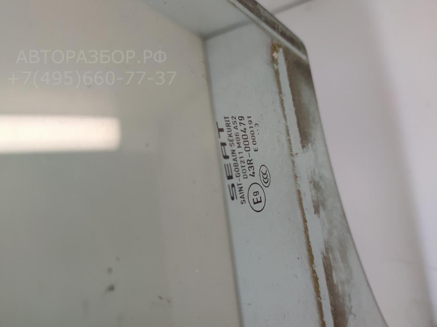 Стекло двери передней левой