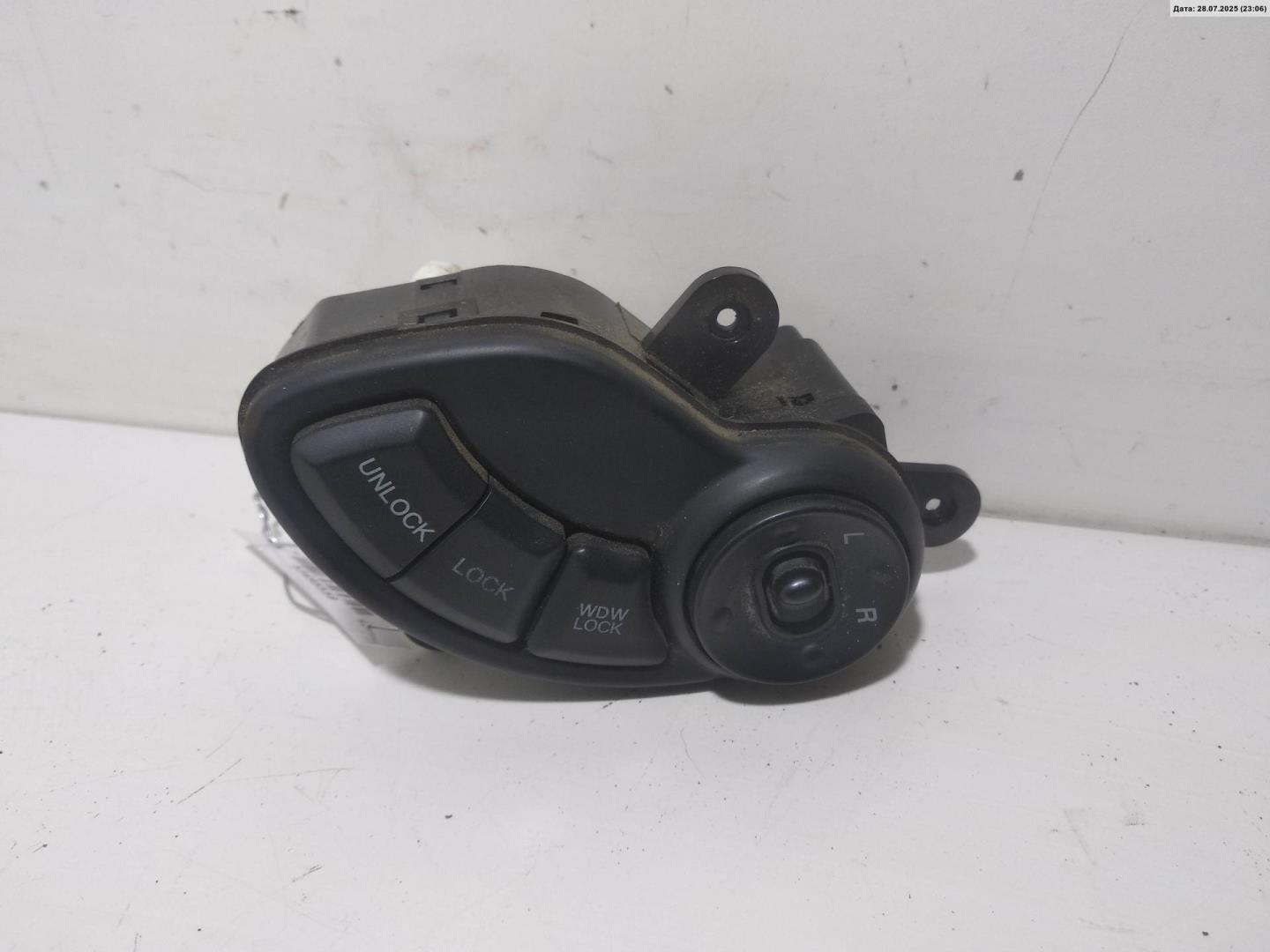 Кнопка регулировки зеркала