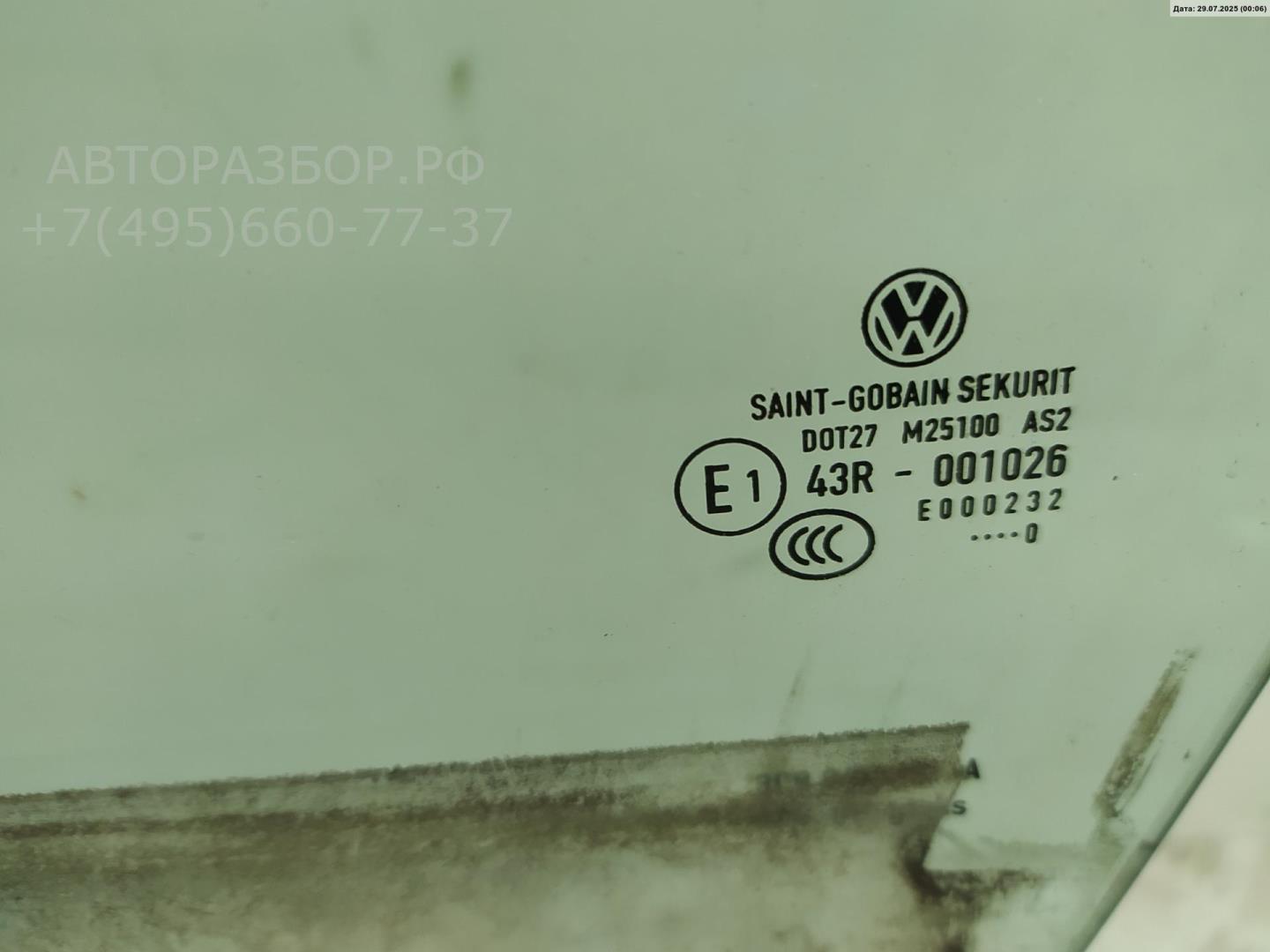 Стекло двери передней левой