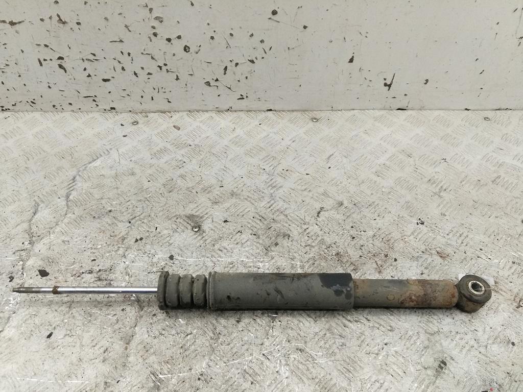 Амортизатор задний левый