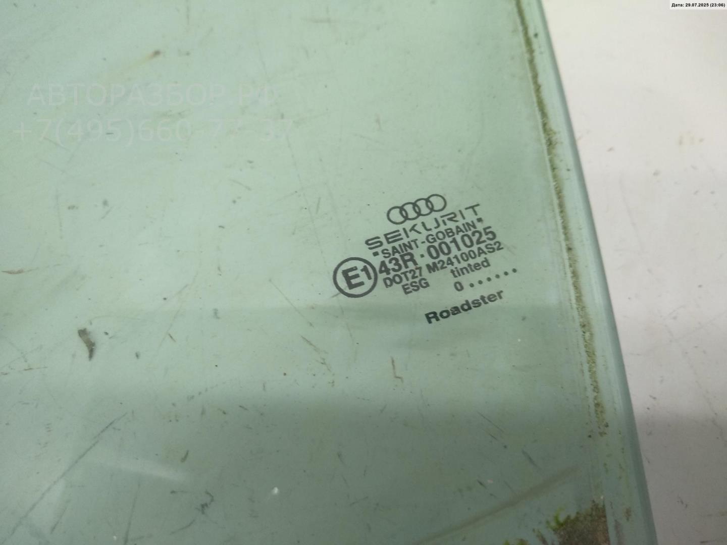 Стекло двери передней левой