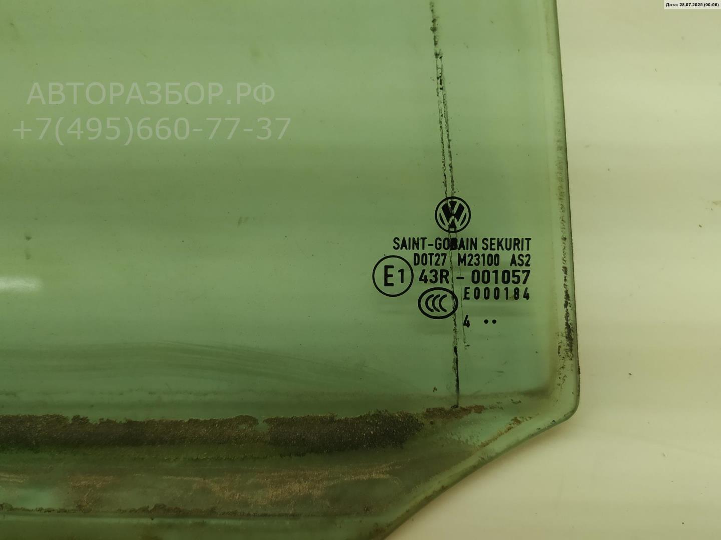 Стекло двери задней левой (форточка)