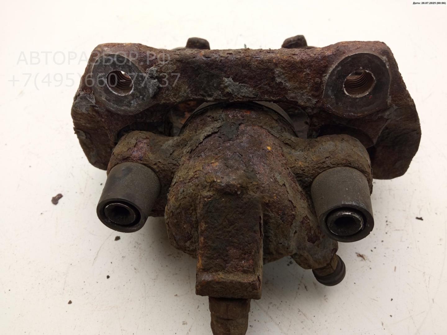 Суппорт задний левый