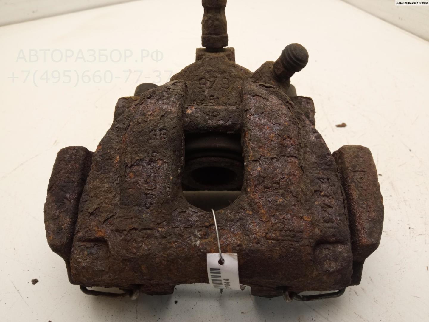 Суппорт задний левый