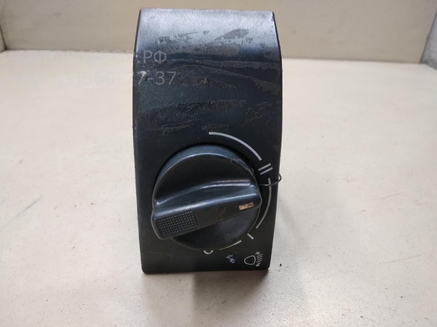 Кнопка корректора фар