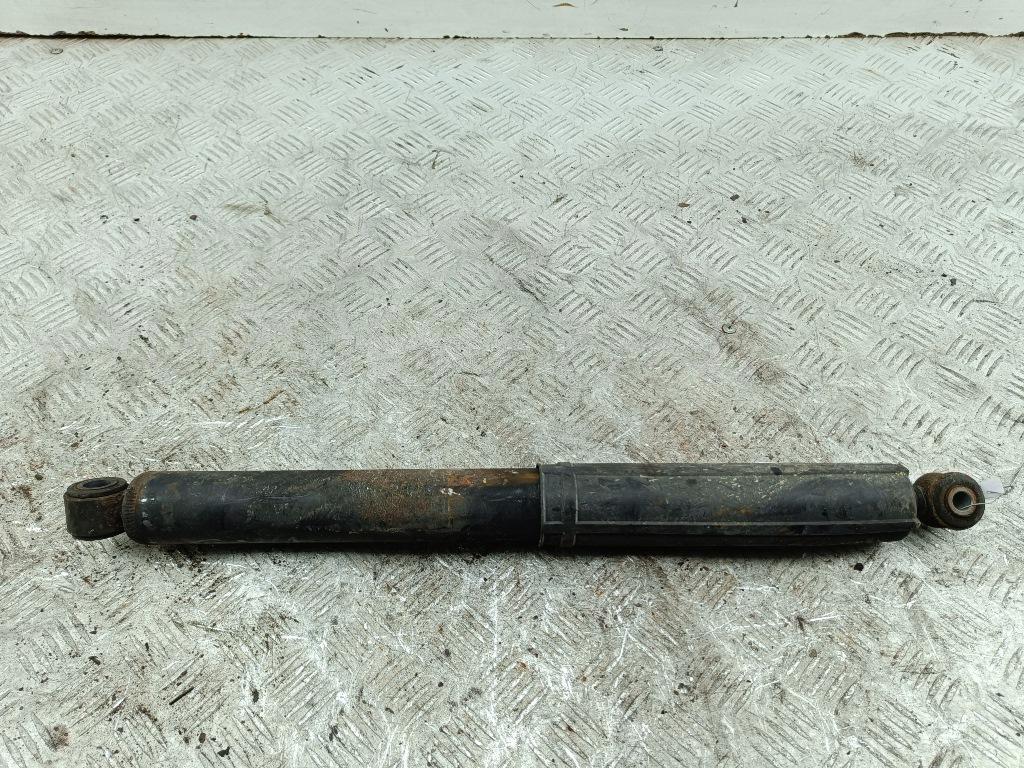 Амортизатор задний левый