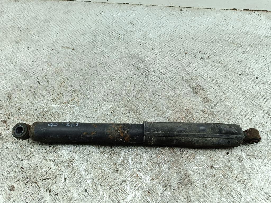 Амортизатор задний левый