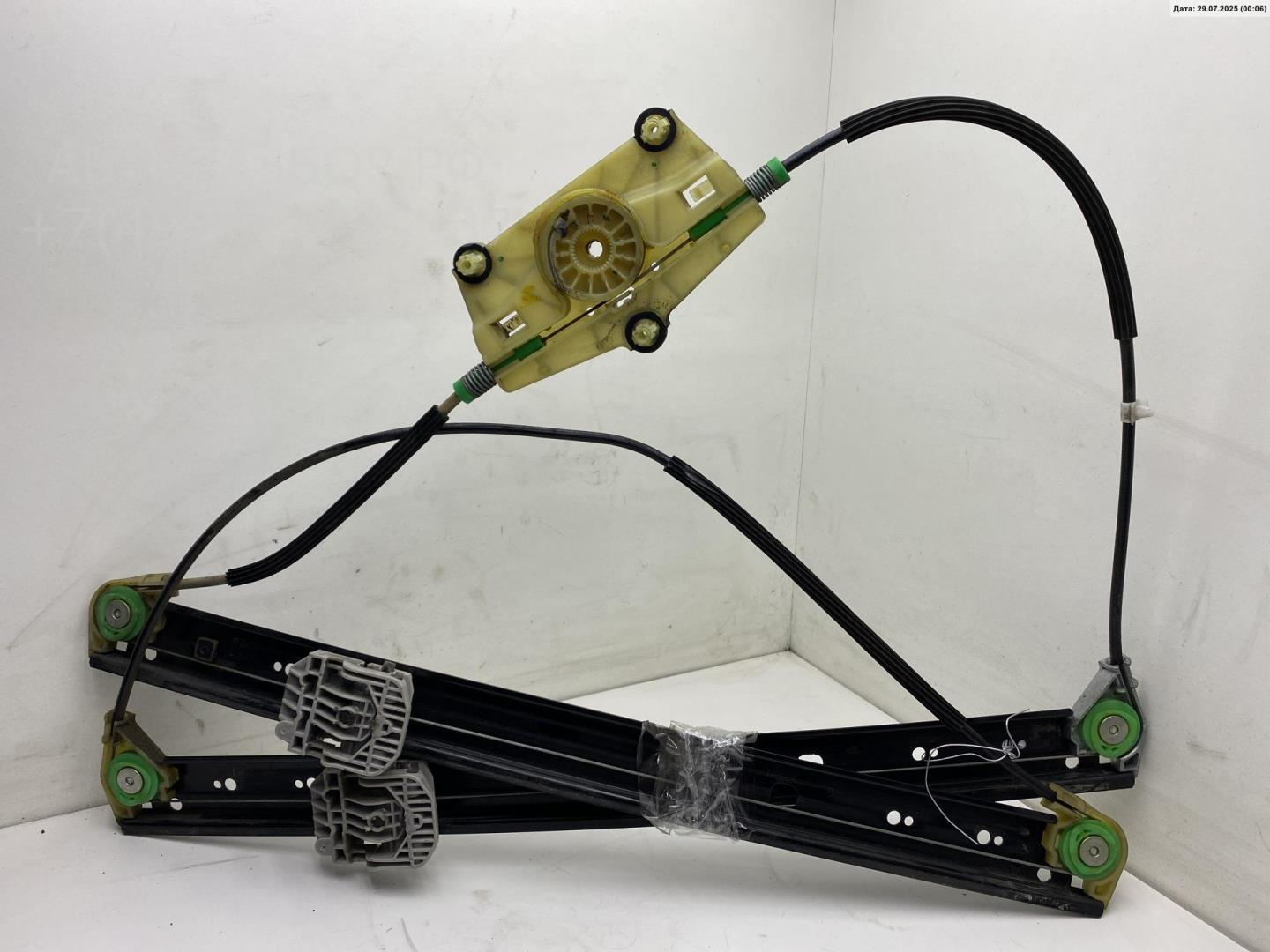 Стеклоподъемник электр. передний левый