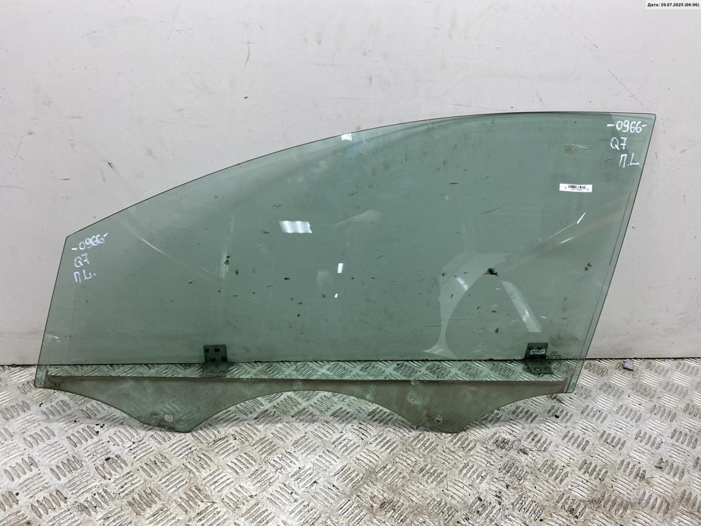 Стекло двери передней левой