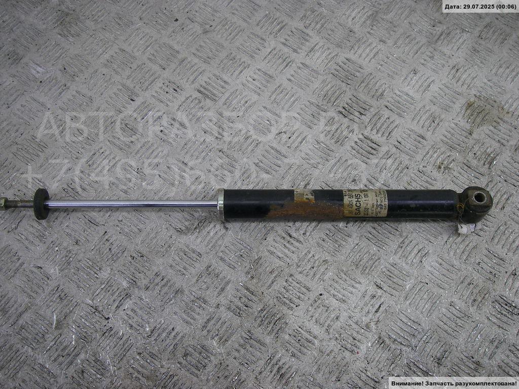 Амортизатор задний левый