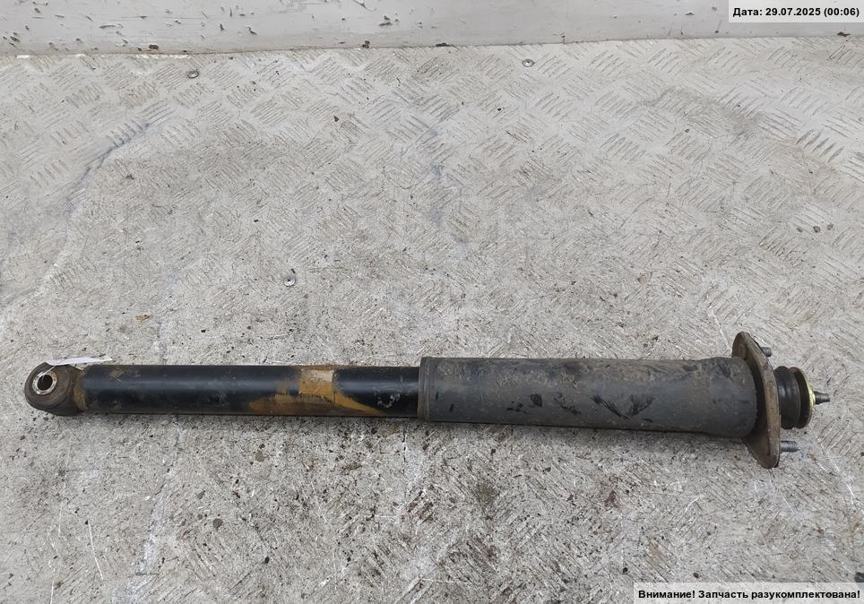 Амортизатор задний левый