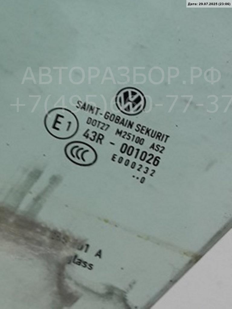 Стекло двери передней левой