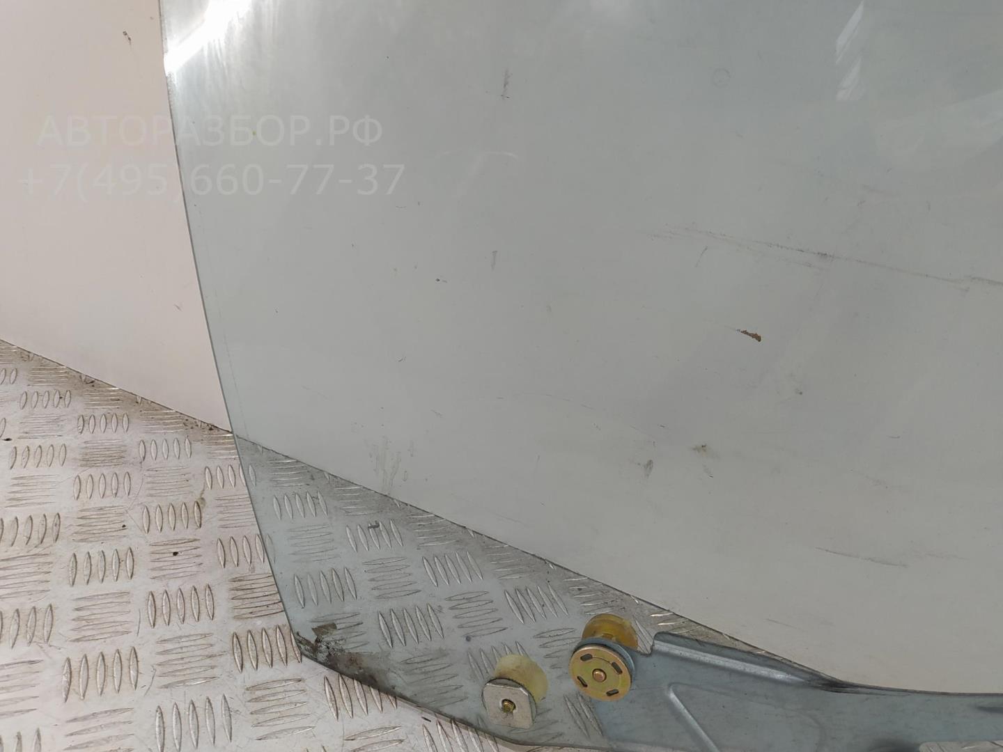 Стекло двери задней левой
