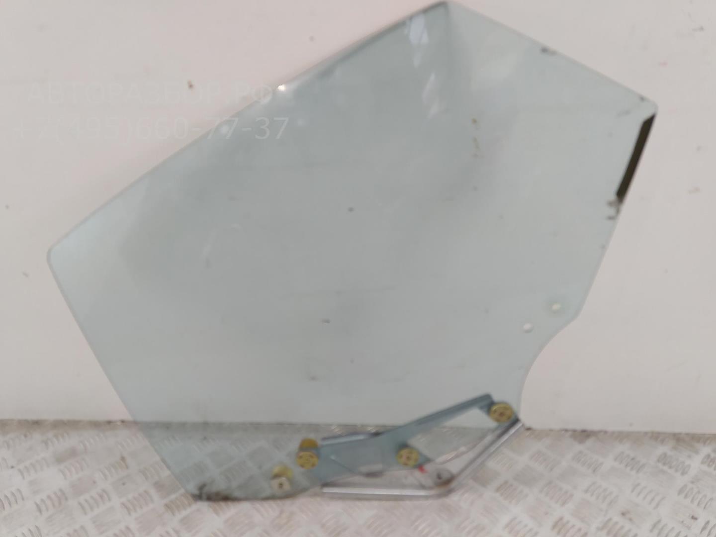 Стекло двери задней левой