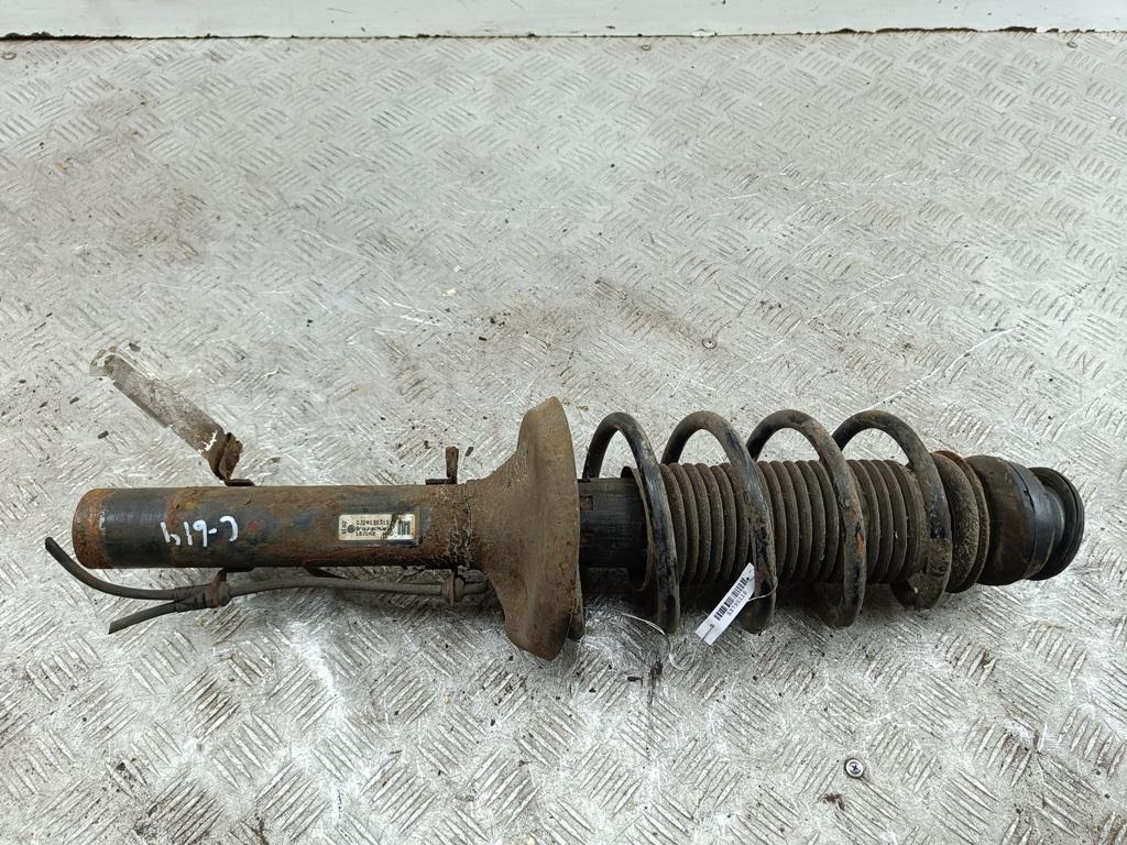 Амортизатор передний левый