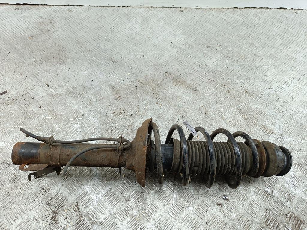 Амортизатор передний левый