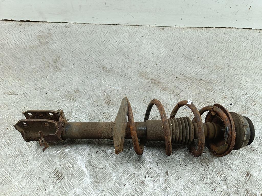 Амортизатор передний левый