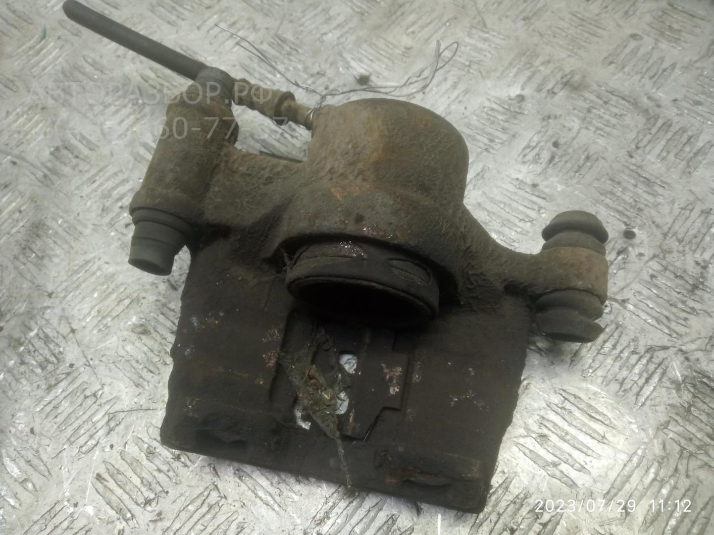 Суппорт передний левый