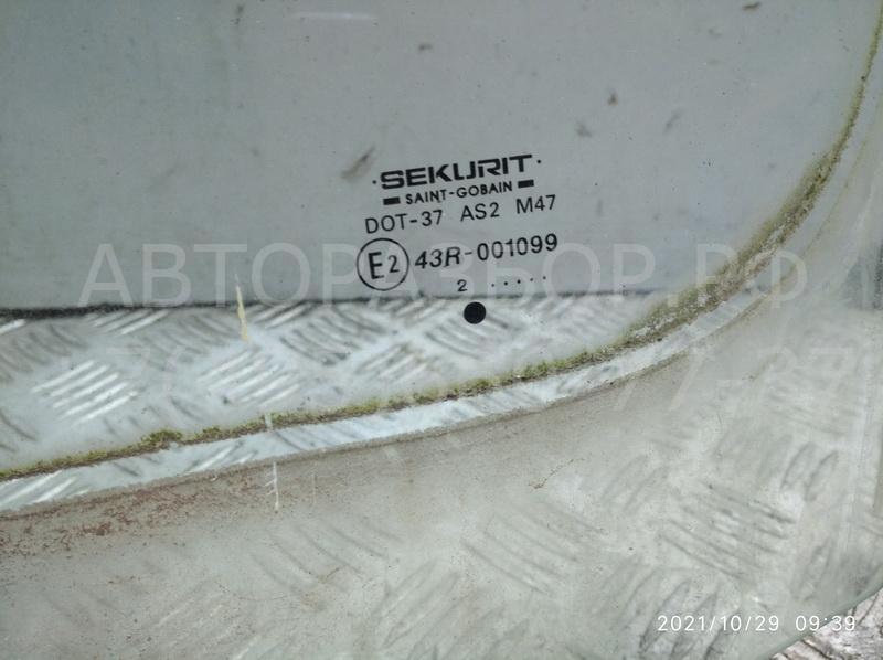Стекло двери передней левой