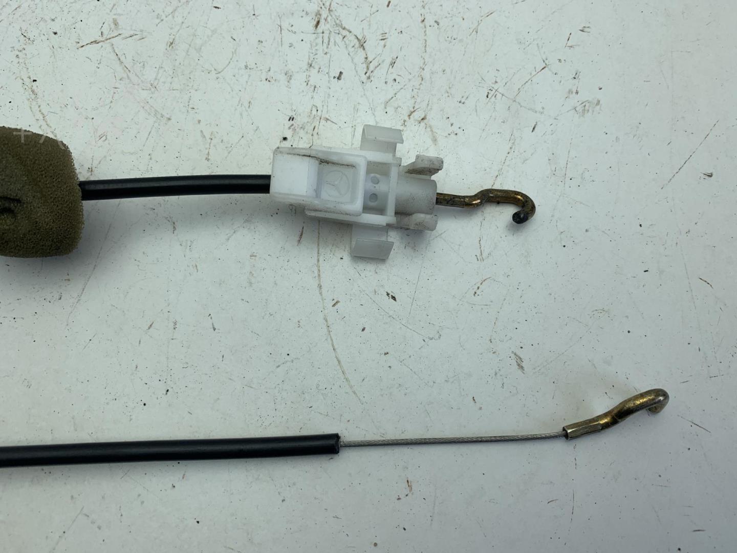 Трос открывания двери