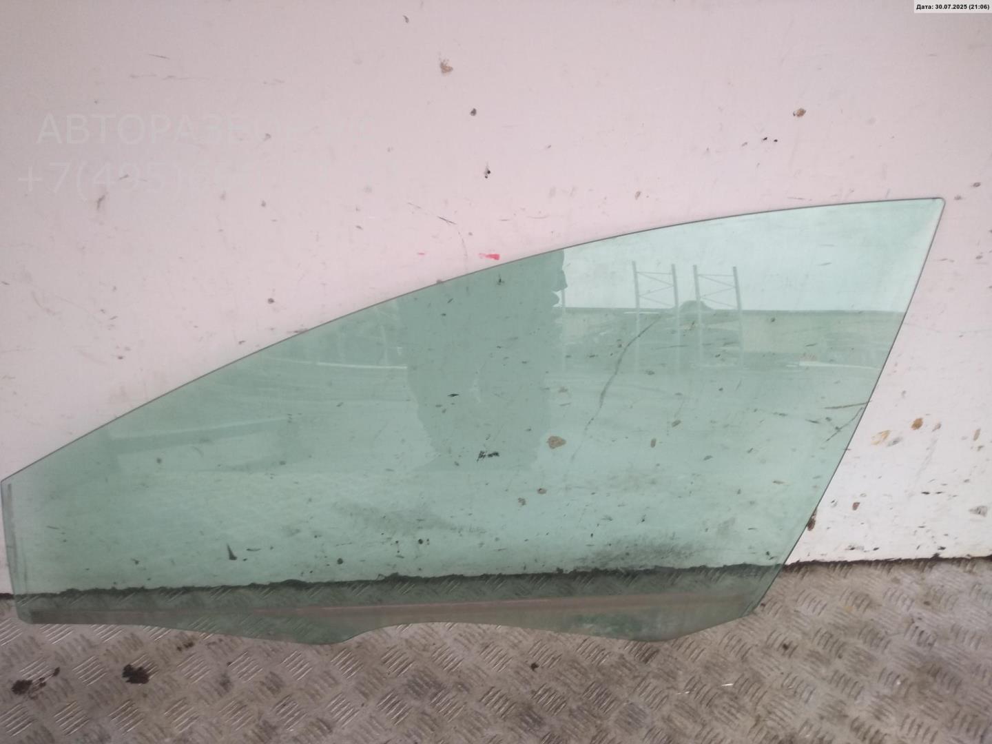 Стекло двери передней левой