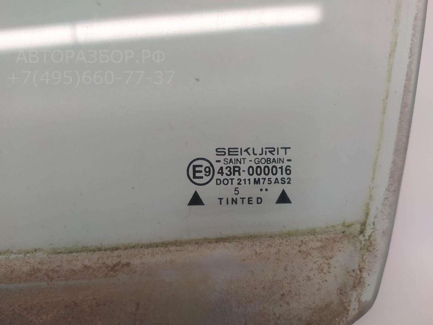 Стекло двери передней левой