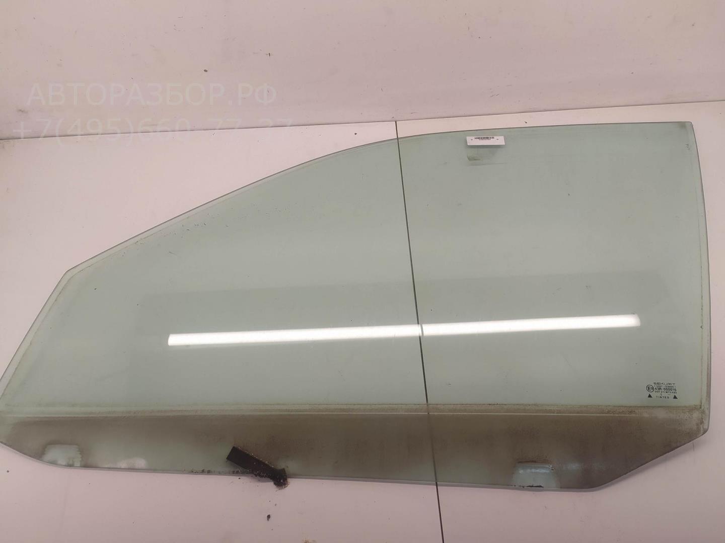 Стекло двери передней левой