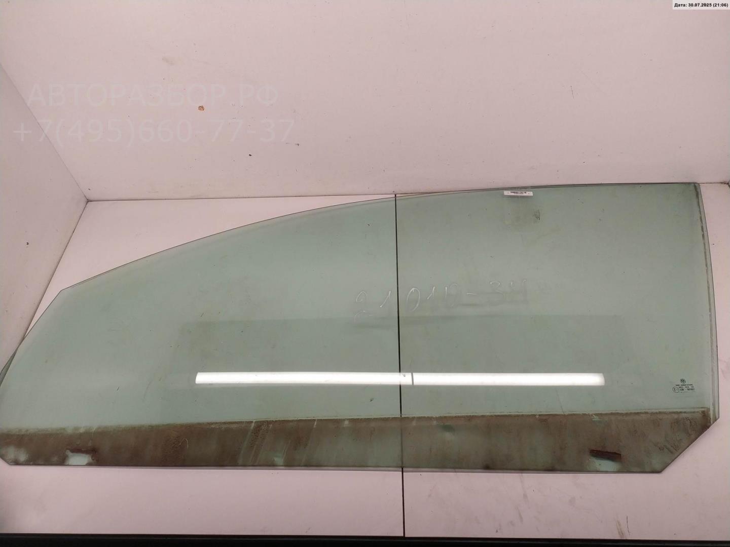Стекло двери передней левой
