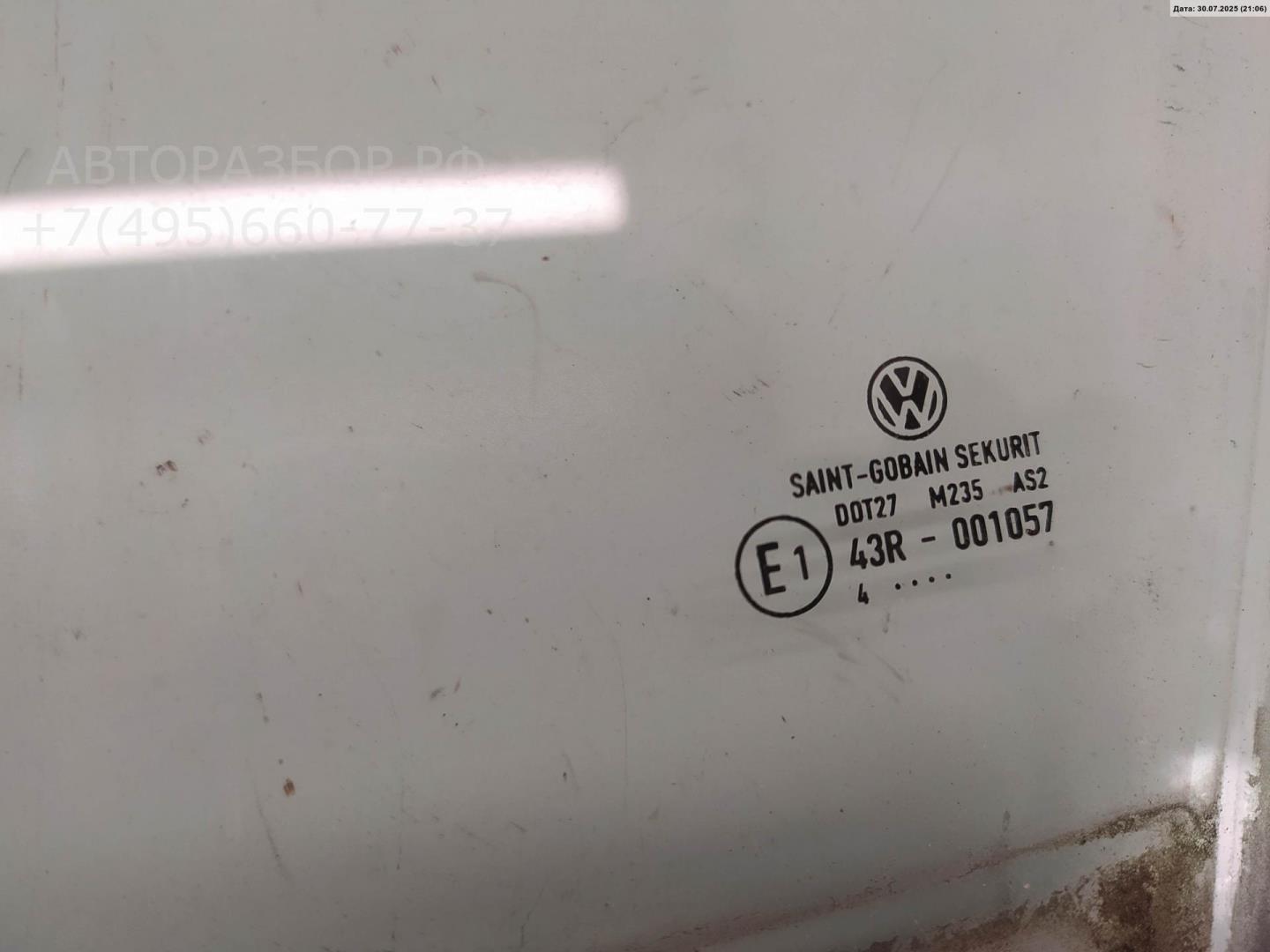 Стекло двери передней левой