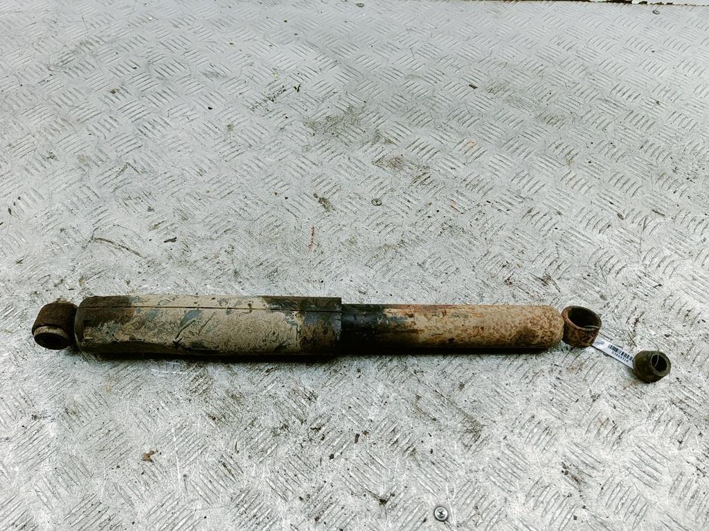 Амортизатор задний левый